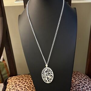Vintage Monet White Gold Plated Necklace with Intricate Oval Bird Pendant.